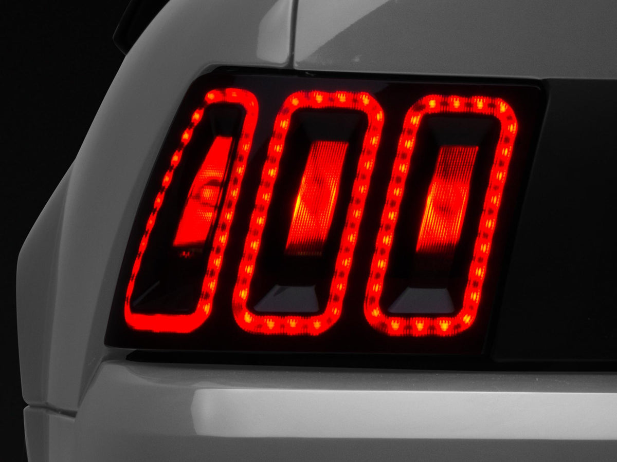 Raxiom 99-04 Ford Mustang Excluding 99-01 Cobra Icon LED Tail Lights- Black Housing (Smoked Lens) - 100807