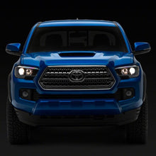 Raxiom 16-23 Toyota Tacoma Axial Series OE Replacement Headlights- Black Housing- Clear Lens