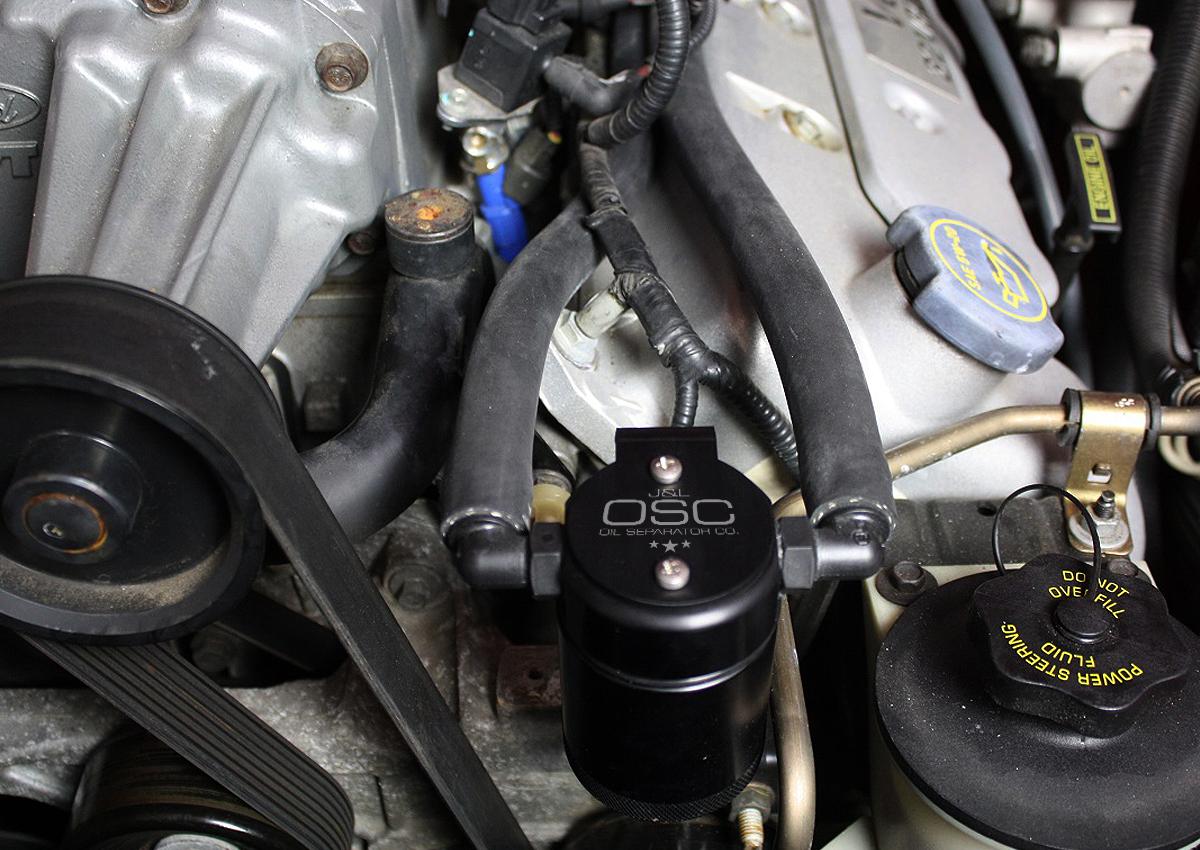 J&L Drivers Side 3.0 Oil Separator - Black Anodized (1999-2004 Ford Mustang Cobra & 2003-2004 Ford Mustang Mach 1) - 3018D-B