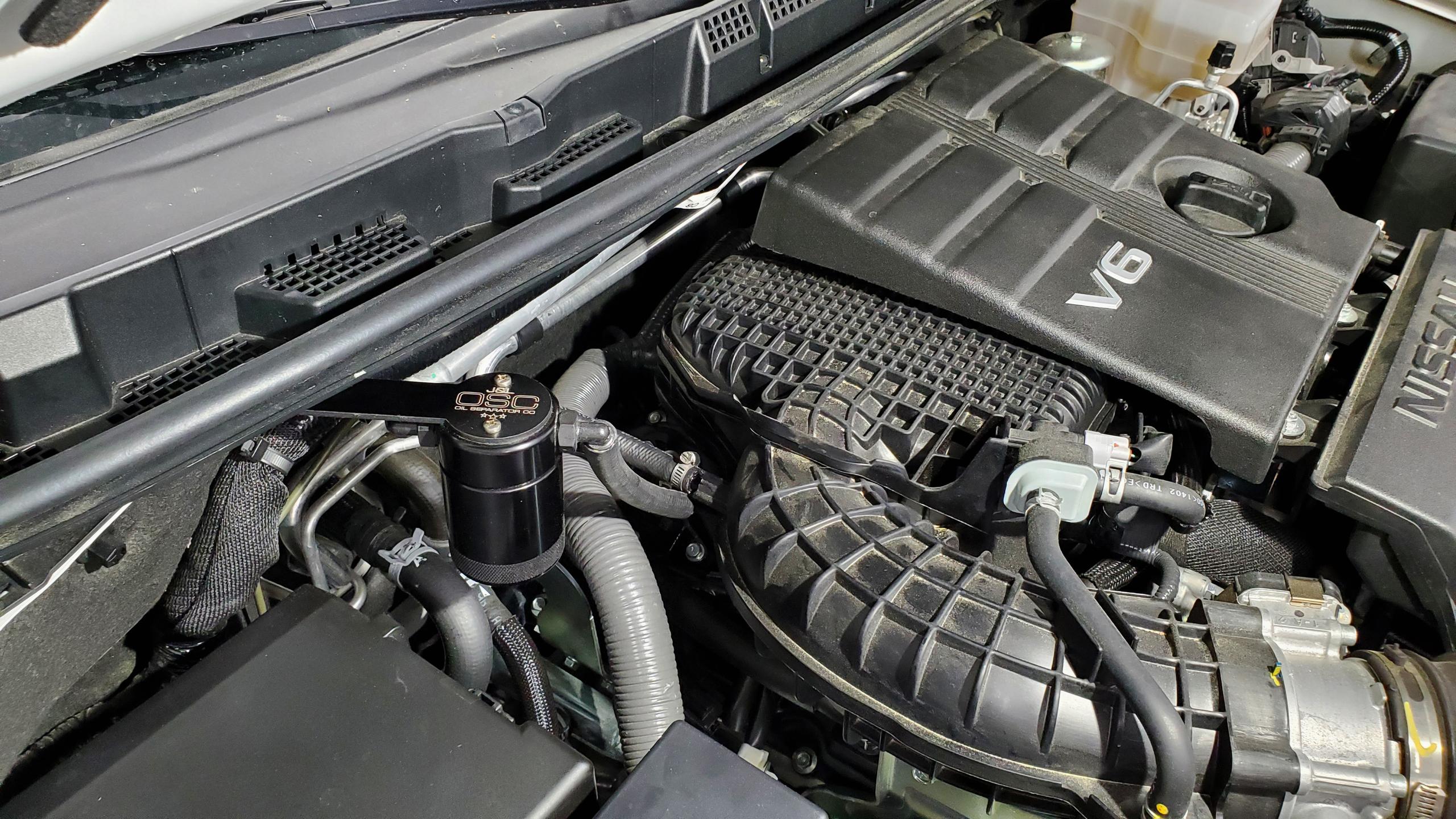 J&L 3.0 Passenger Side Oil Separator - Black Anodized (2022 Nissan Frontier 3.0L) - 3113P-B