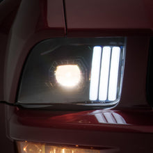 Raxiom 05-09 Ford Mustang w/ Halogen Prjctor Headlights- Black Housing (Clear Lens) (No GT500 ) - 415794