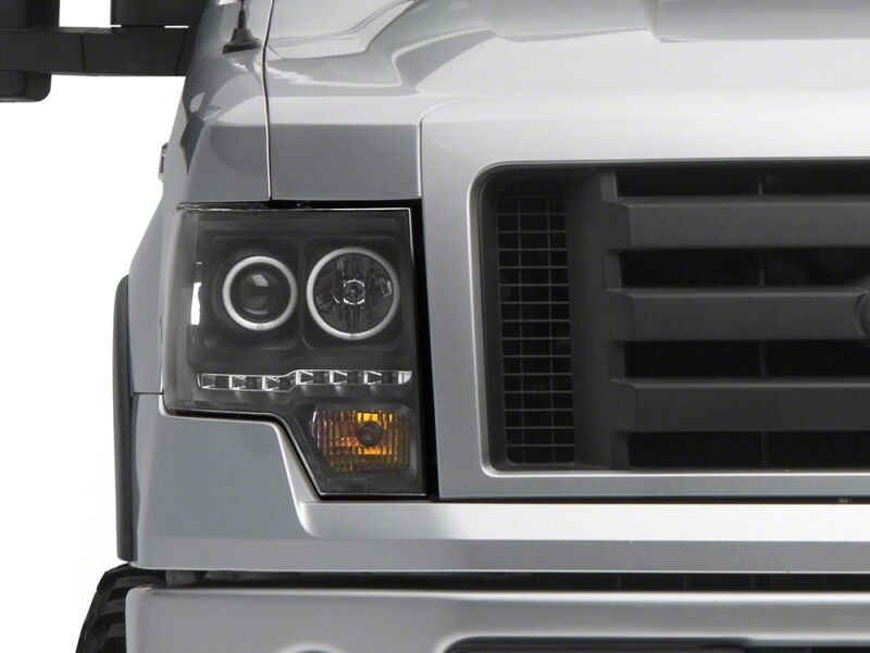 Raxiom 09-14 Ford F-150 G2 Super White LED Halo Projector Headlights- Black Housing- Clear Lens