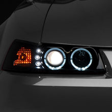 Raxiom 99-04 Ford Mustang Dual LED Halo Projector Headlights- Black Housing (Smoked Lens) - 49113