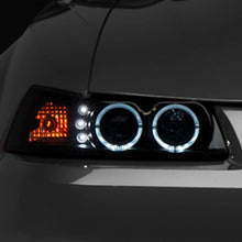 Raxiom 99-04 Ford Mustang Dual LED Halo Projector Headlights- Black Housing (Smoked Lens) - 49113