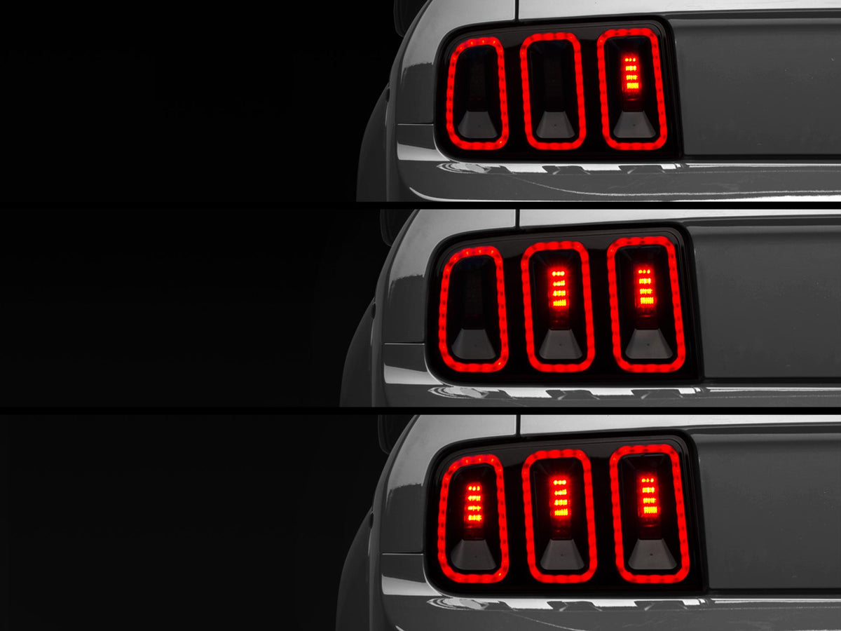 Raxiom 05-09 Ford Mustang Gen5 Tail Lights- Black Housing (Smoked Lens) - 49169