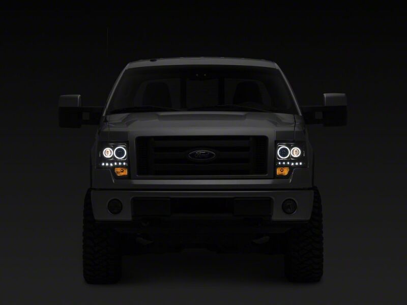 Raxiom 09-14 Ford F-150 G2 Super White LED Halo Projector Headlights- Black Housing- Clear Lens