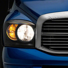 Raxiom 06-08 Dodge RAM 1500 Axial Series Euro Headlights- Black Housing- Clear Lens