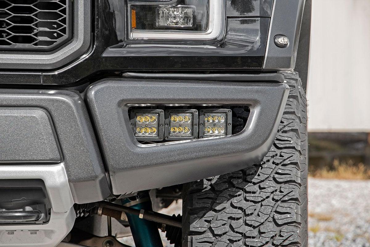 Rough Country Ford Triple LED Fog Light Kit, Black Series w/Amber DRL (17-19 F-150 Raptor) - 70700DRLA