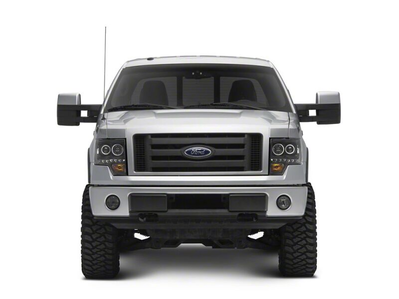 Raxiom 09-14 Ford F-150 G2 Super White LED Halo Projector Headlights- Black Housing- Clear Lens