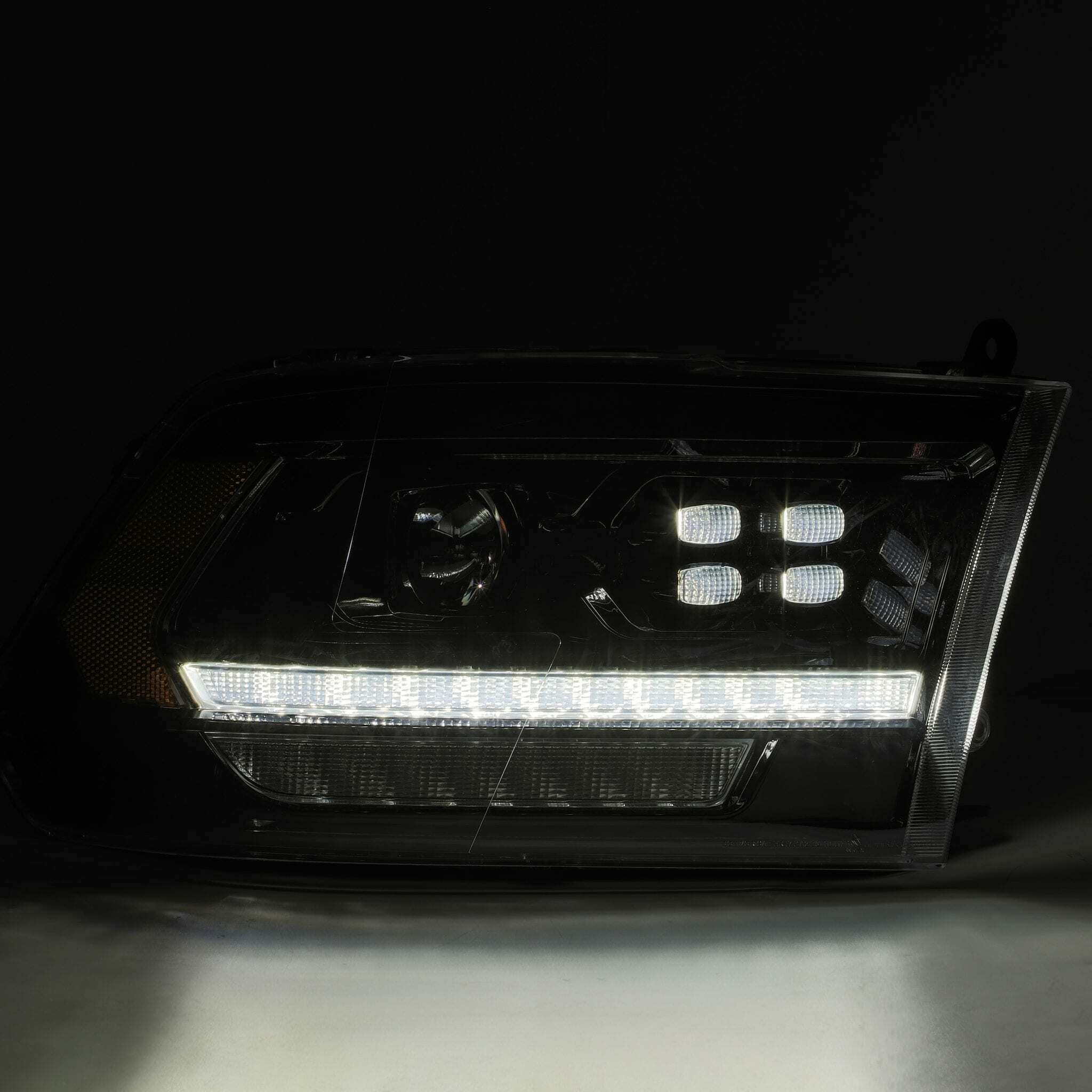 AlphaRex  Pro-Series Halogen Heads: Dodge Ram (09-18) (19+ HD Look) - AlphaBlack Black (Set) (Dodge Ram (09-18)) - 880524