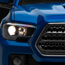 Raxiom 16-23 Toyota Tacoma Axial Series OE Replacement Headlights- Black Housing- Clear Lens