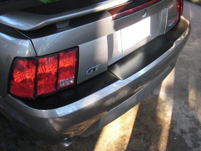 Anchor Room Complete Top Bumper Panel (1999-2004 Mustang) - Black - Gloss - 99FM_TBC_G