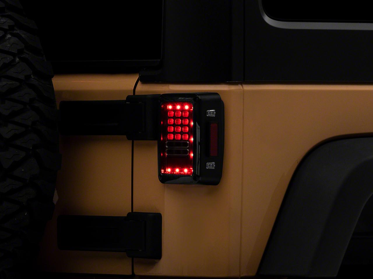 Raxiom Axial Series Led Tail Lights; Black Housing; Clear Lens (2007-2018 Wrangler, Wrangler JK) - J141585