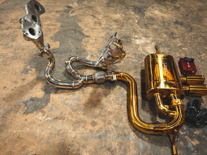 Valvetronic Designs Lotus Evora 3.5L, Full Exhaust System With Free Flow Headers, T304 Stainless Steel Finished in Anodized Gold, Gold 3.5 Inch Outlet Tips - LOT.EVOR.VSES.FFH.AG
