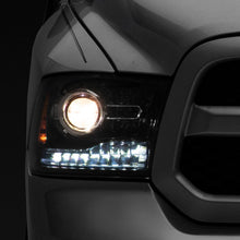 Raxiom 09-18 Dodge RAM 1500 LED Halo Headlights w/Switchback Turn Signals- Blk Housing (Clear Lens) - R111518