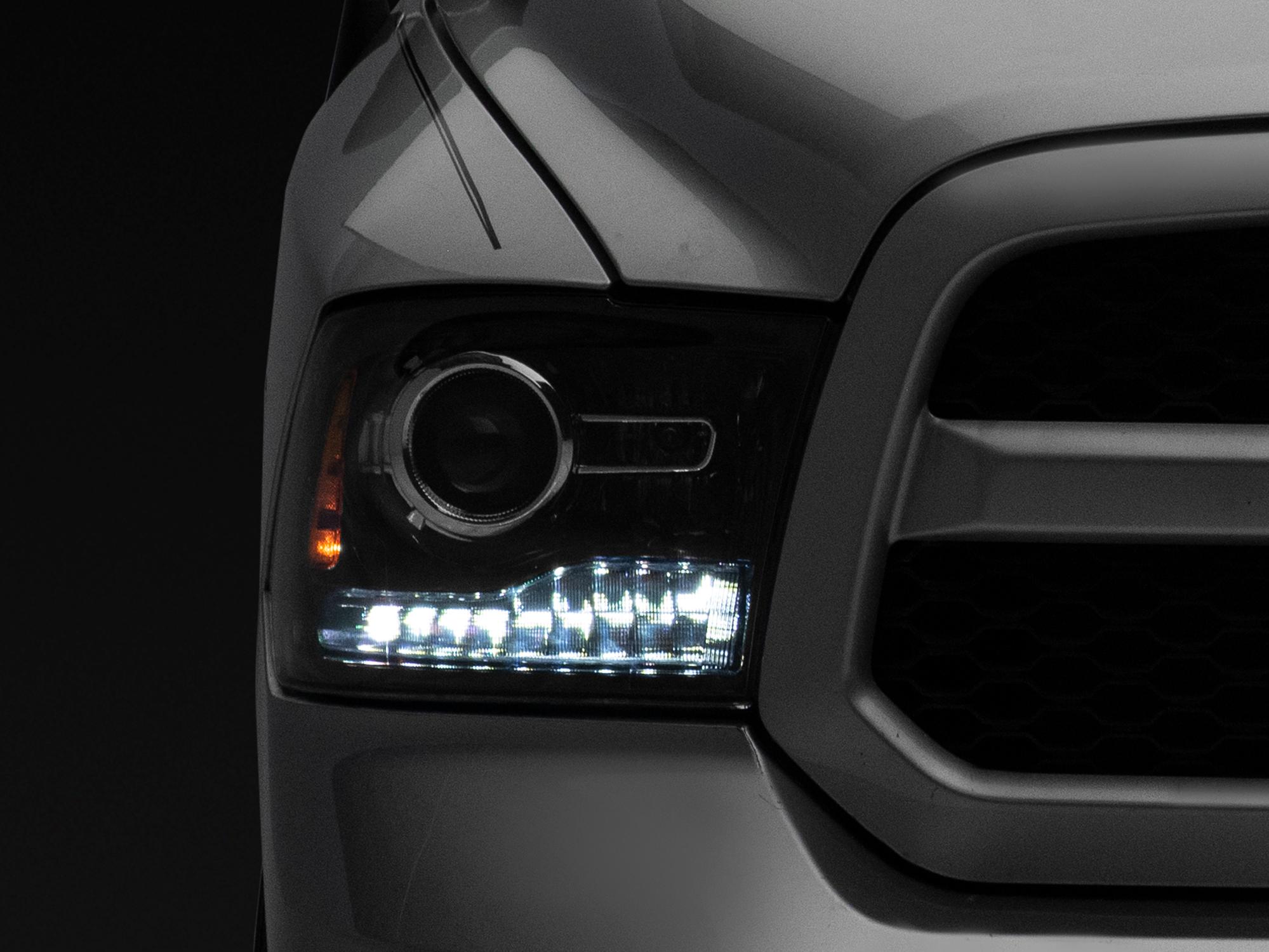 Raxiom 09-18 Dodge RAM 1500 LED Halo Headlights w/Switchback Turn Signals- Blk Housing (Clear Lens) - R111518
