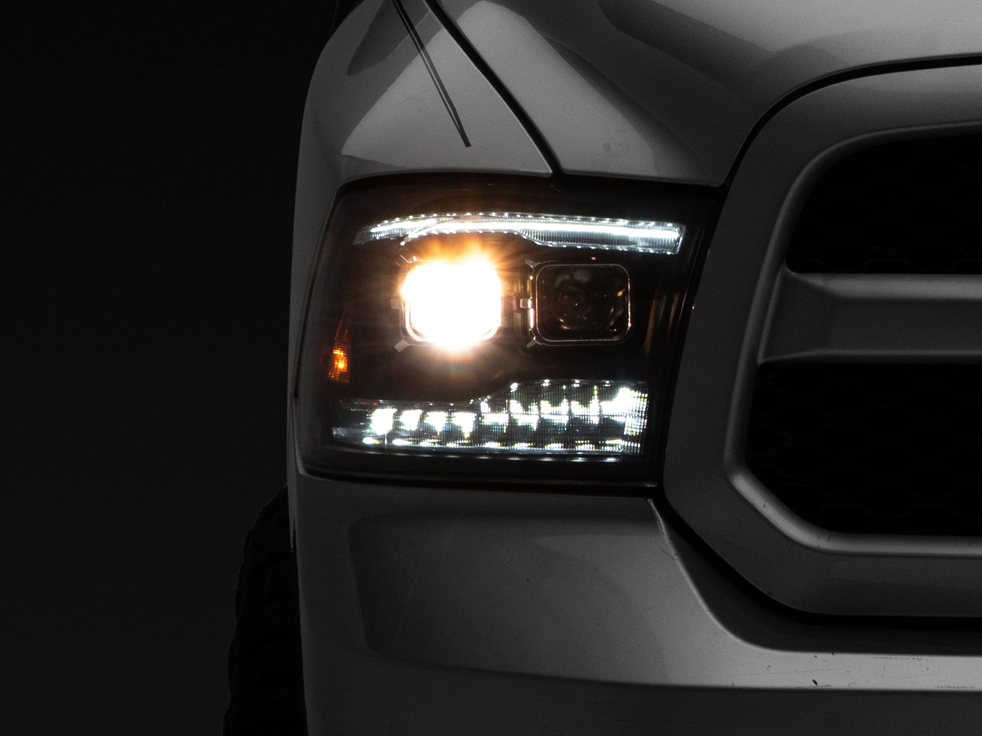 Raxiom 09-18 RAM 1500 LED Projector Headlights w/ Switchback Turn Signals- Blk Housing (Clear Lens) - R111520