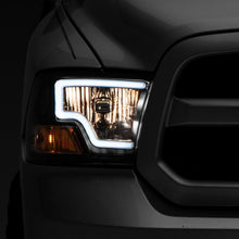 Raxiom 09-18 Dodge RAM 1500 LED Bar Headlights- Black Housing (Clear Lens) - R117803