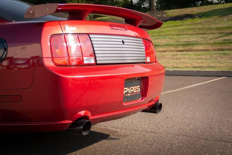 Pypes Cat Back Exhaust System 05-10 Mustang GT Split Rear Dual Exit 2.5 in Intermediate And Tail Pipe M80 Muffler/Hardware/4 in Polished Tips Incl Natural Finish 409 Stainless Steel Pypes Exhaust - SFM66M