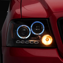 Raxiom 04-08 Ford F-150 Dual LED Halo Projector Headlights- Black Housing (Clear Lens) - T542827