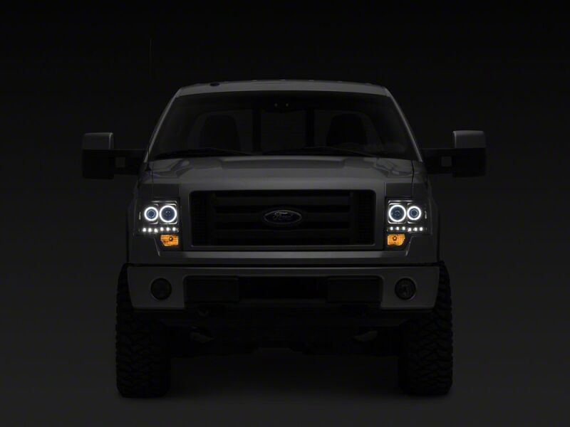 Raxiom 09-14 Ford F-150 G2 Super White LED Halo Projector Headlights- Black Housing- Clear Lens